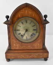 An Edwardian inlaid eight day mantel clock on gilt brass ball feet, height 33.5cm. Condition Report: