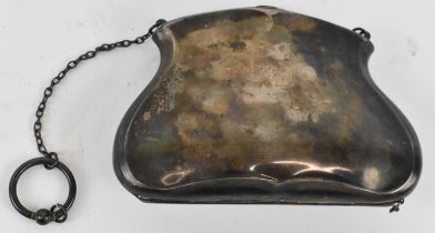 JOHN HENRY WYNN; an Edward VII hallmarked silver purse, with leather fitted interior, Birmimgham