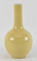 A 20th century Chinese porcelain yellow ground Guan type bottle vase, height 23.5cm.