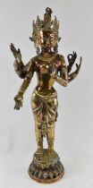 An Indian brass and coppered figure of Shiva, height 78cm.
