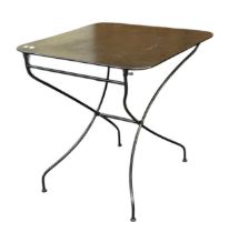 A wrought iron folding garden table, top measures 70 x 70cm.