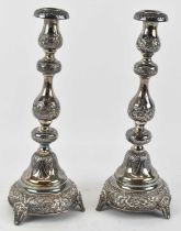 JOSEPH ZWEIG; a pair of George V hallmarked silver candlesticks, height 29.5cm (loaded).