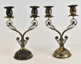 A pair of 900 grade two branch candlesticks, height 20cm.