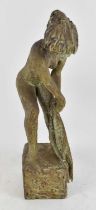 † RON WOOD (1922-2009); a plaster figure of a nude female, with creamy green glaze, height 22cm.