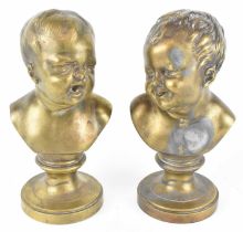 A pair of late 19th/early 20th century gilt bronze models of young boys, height 20cm.