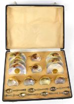 HARRY STINTON FOR ROYAL WORCESTER; a cased set of six hand painted teacups and saucers decorated