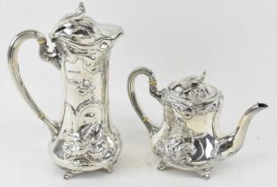 X HENRY ATKIN; a George V hallmarked silver teapot with floral decoration, height 14cm, together