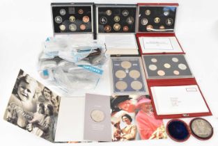 A large quantity of predominantly GB coinage including Royal Mint packs, half crowns, pennies,