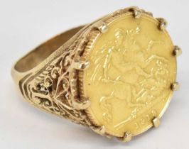 A George V 1918 half sovereign in 9ct yellow gold ring mount, size M, approx 8.9g.