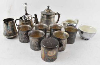WMF; a three piece silver plated tea service comprising teapot, sugar bowl and milk jug, a WMF