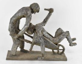 † RON WOOD (1922-2009); a large abstract bronzed fibreglass model of a man pushing a drunken