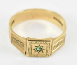 A 9ct yellow gold gentleman's signet ring set with small central emerald, size X, approx 5g.