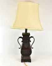 A Japanese bronze twin handled vase converted to a table lamp, on carved hardwood base, height to