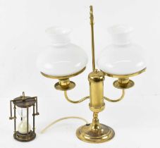 A brass double oil burner lamp converted to electricity and a brass sand timer (2).