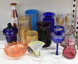 A group of 19th century and later coloured glassware including a blue glass lidded vase, inscribed
