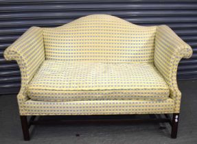 A reproduction Georgian style sofa, on square supports, width 135cm. Condition Report: No rips,