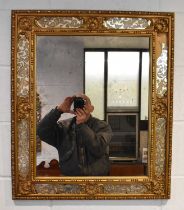 A 20th century gilt framed decorative wall mirror, 76 x 65cm. Condition Report: Please note there