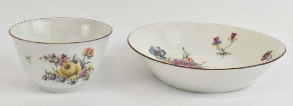 CHELSEA; a red anchor tea bowl and saucer (part af). Condition Report: Crack to saucer and small
