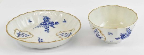 WORCESTER; a first period Worcester dry blue tea bowl and saucer, diameter of bowl 7.5cm.