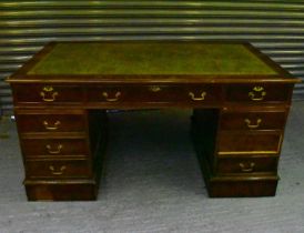 A reproduction mahogany pedestal desk with gilt tooled leather insert top, width 155cm, depth