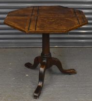 A 19th century oak octagonal tripod table with ebony inlaid top, 77 x 77cm.