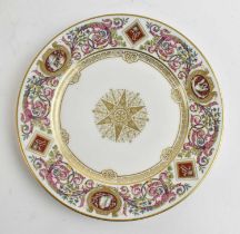 SEVRES; a porcelain plate from the service for Louis Philippe, with elborate borders of scrolling