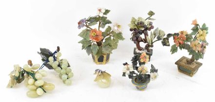 A group of four Chinese style hardstone flower displays, two hardstone displays of bunches of grapes