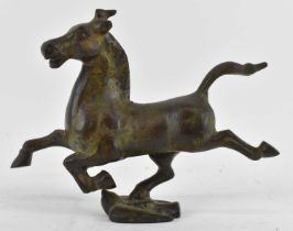 A modern bronze sculpture of a prancing horse, height 14cm, length 18.5cm.