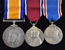 A trio of medals comprising a WWI BritishWar Medal, awarded to Lieut.W.E.Hodge, a George V and Queen