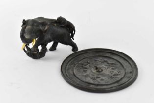 A small Japanese Meiji period bronze figure of elephant and tiger, with two character mark to