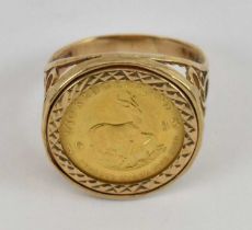 A 1983 1/10 ounce Krugerrand in 9ct yellow gold ring mount, size P, approx 6.1g.