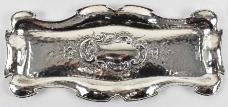 CHARLES COOKE; an Edward VII hallmarked silver hammered rectangular tray, Chester 1902, 25 x 11cm,