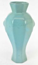 A Chinese turquoise glazed vase with twin handled decoration, height 22cm.