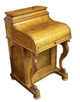 A Victorian walnut piano top Davenport, width 56.5cm, depth 58cm, height 95cm.