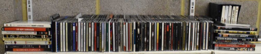 A quantity of CDs and DVDs.