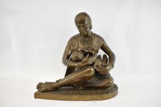 A large Indian bronze figure of a mother breastfeeding her child, height 50cm, width 50cm.