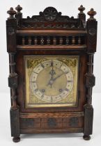 A large late 19th century oak cased eight day mantel/bracket clock, height 45cm.