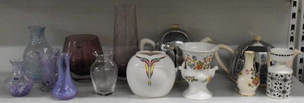 CAITHNESS; a purple art glass vase, height 23cm, blue art glass vase, height 17cm, purple glass