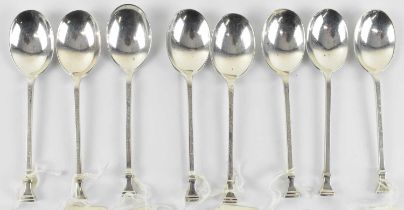 JOSIAH WILLIAMS & CO; a set of three George V hallmarked silver spoons, inscribed 'Tehidy Park