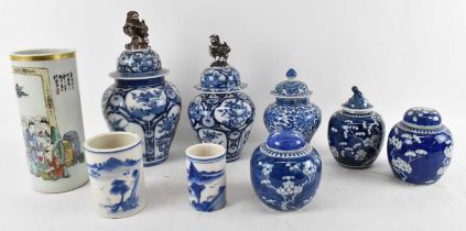 A group of modern decorative Chinese items, including a pair of blue and white lidded ginger jars,