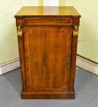 A Regency rosewood single door music cabinet with interior dividers, width 55cm, depth 45cm,
