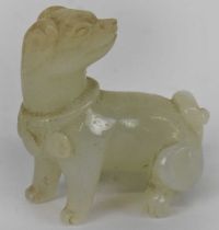 A small Chinese white jade figure of a dog, height 5cm, length approx 5cm.