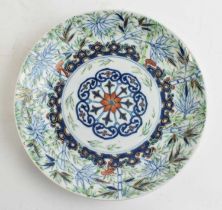 An early 20th century Chinese plate, bears Qianlong mark to base, diameter 20.5cm. Condition Report: