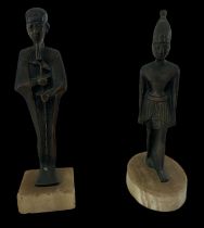 Two 20th century Ancient Egyptian style bronze figures of pharaohs on hardstone bases, the tallest