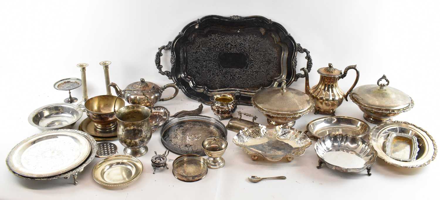 A quantity of silver plated items, including large twin handled tray, dishes, candlesticks,