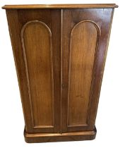 A Victorian mahogany two door and twelve drawer coin collector's cabinet, each drawer with glazed