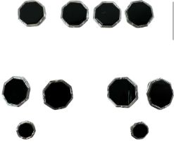 A pair of 9ct white gold cufflinks set with black hardstones, a set of four 9ct white gold and black