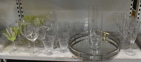 A large quantity of cut and crystal glassware, including a set of six green cocktail glasses on