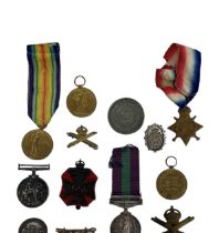 A group of six WWI medals, including a Malaya Medal, 1914-15 Star, three WWI medals and one