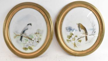 HARRY BRIGHT (1846-1895); a pair of oval watercolours reverse painted on glass, one signed lower